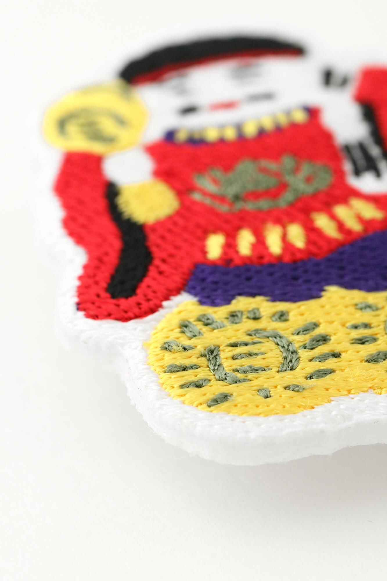 刺繍飾り(ししゅうかざり)/土人形(つちにんぎょう) 大黒(だいこく)さん