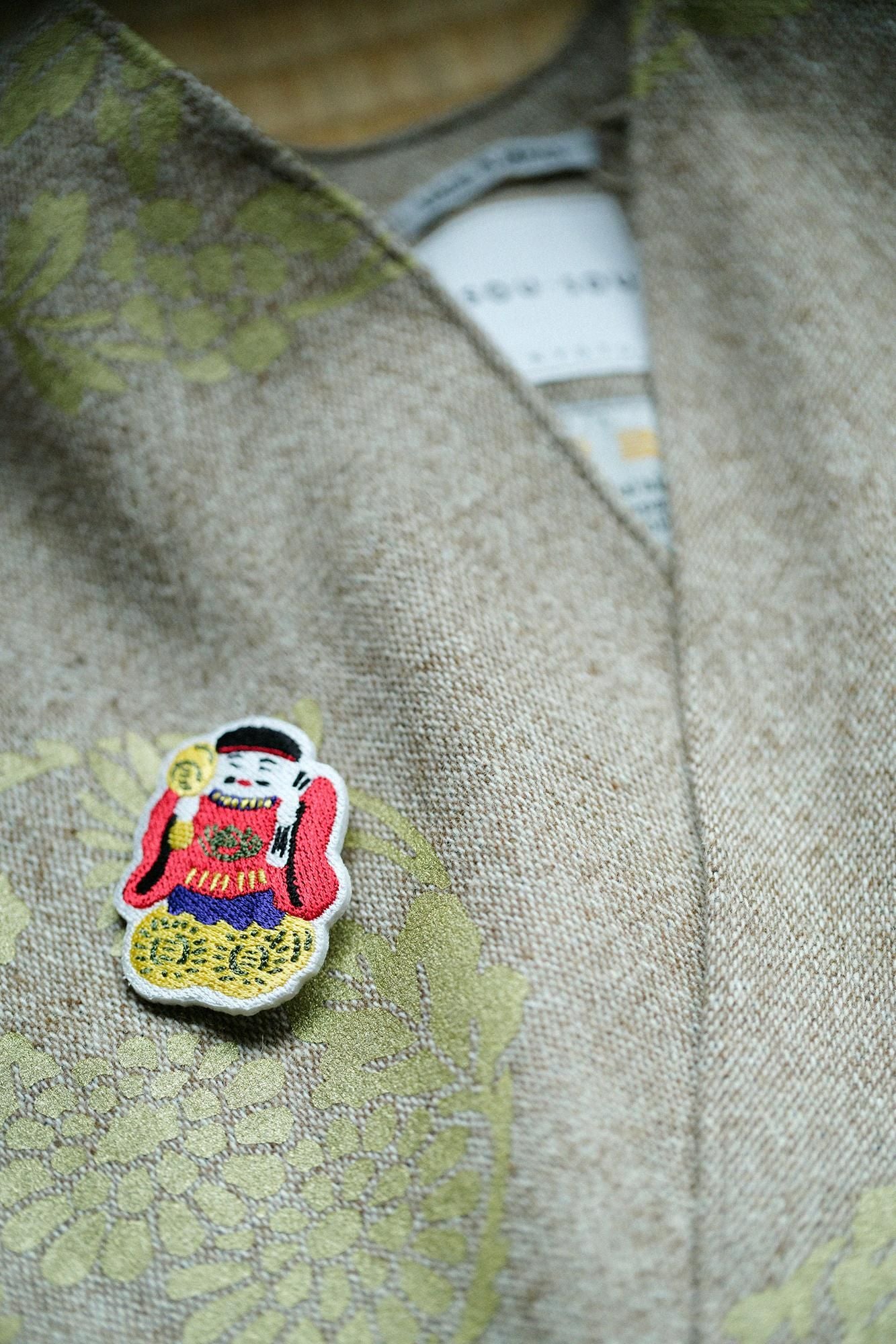 刺繍飾り(ししゅうかざり)/土人形(つちにんぎょう) 大黒(だいこく)さん