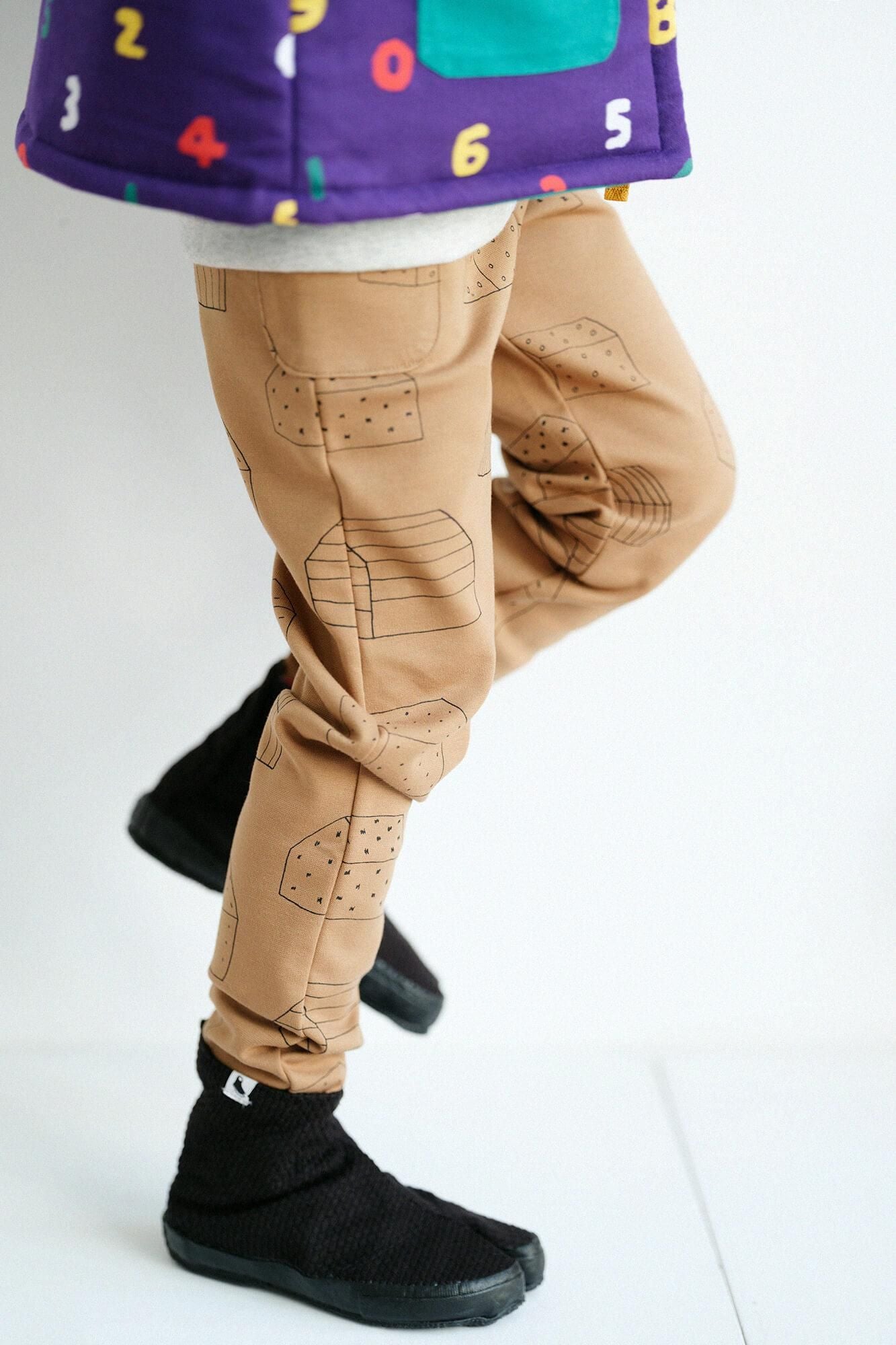 ●高密度棉針織 圖案細腿褲/家 聚落 黃土色