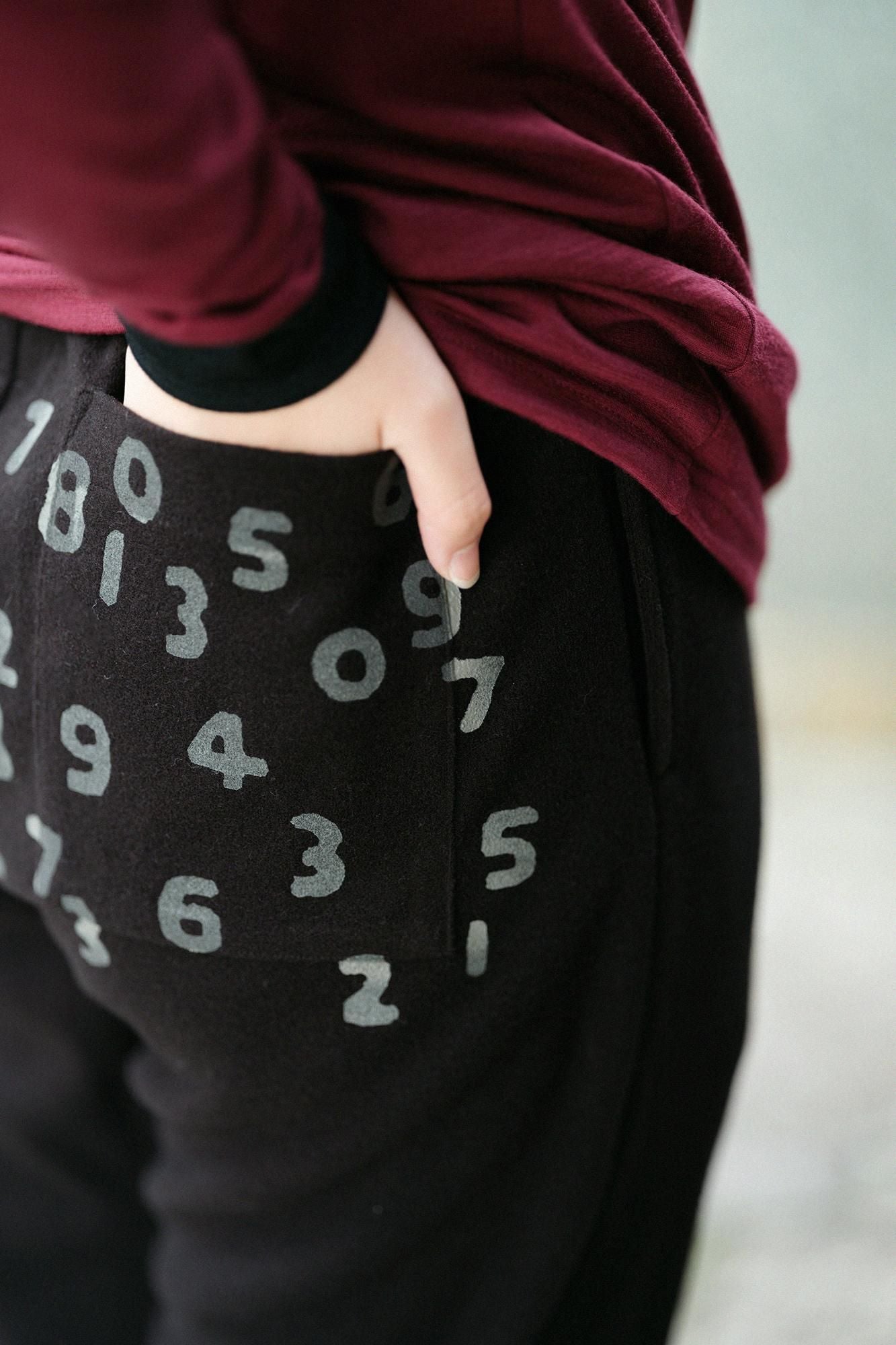 麥爾登柔滑休閒窄管長褲/黑色