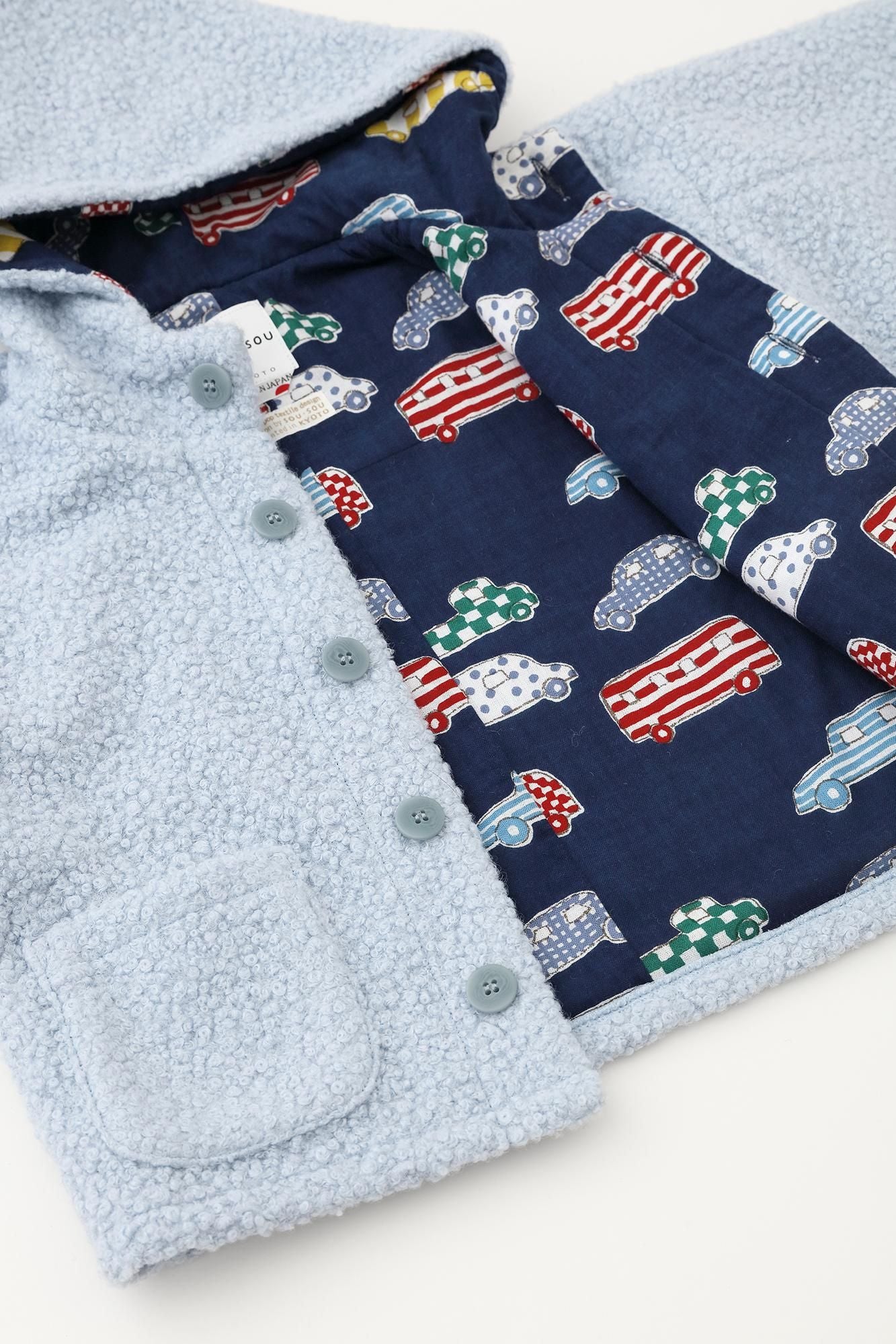 ●仿毛梯形袖連帽外套/淡藍色x汽車