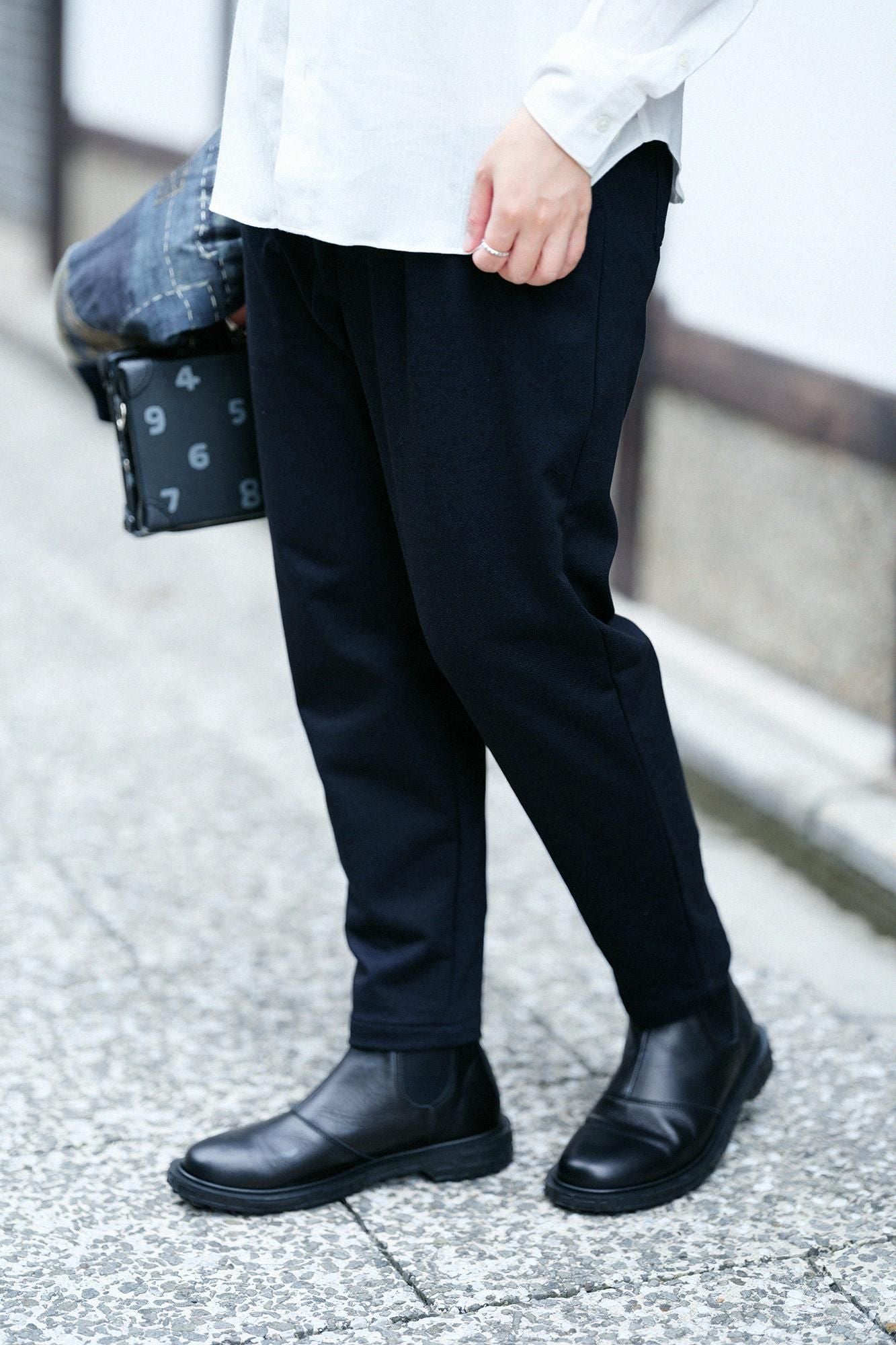 鑲嵌針織 休閒窄管長褲/黑藍色