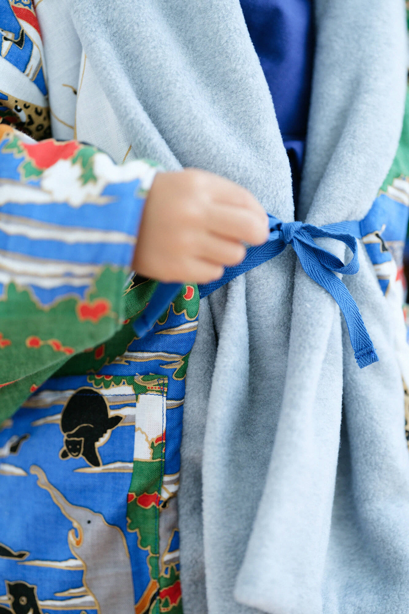 ●抓絨 梯形袖雙面短外套/黑色×怒濤