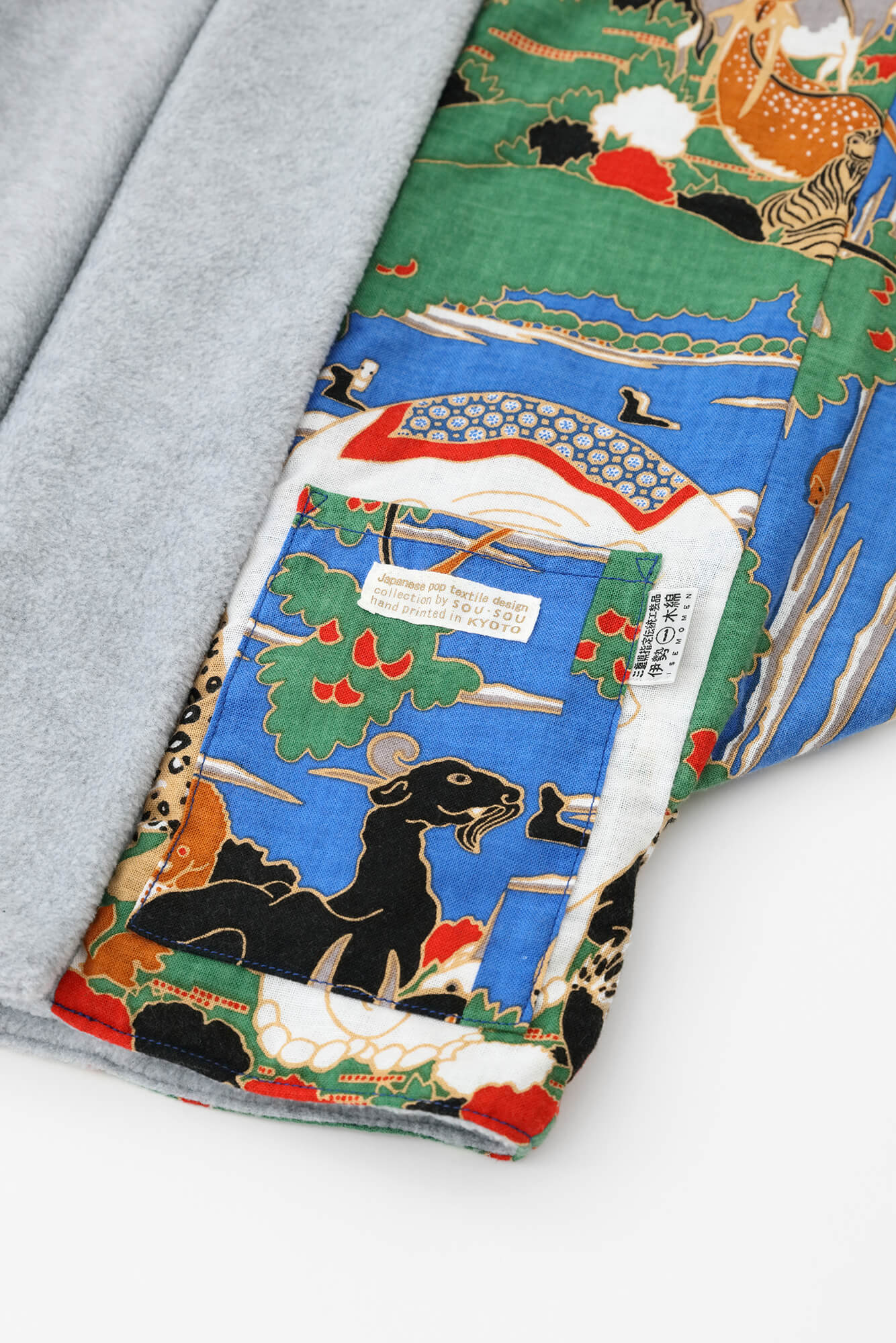 ●抓絨 梯形袖雙面短外套/黑色×怒濤