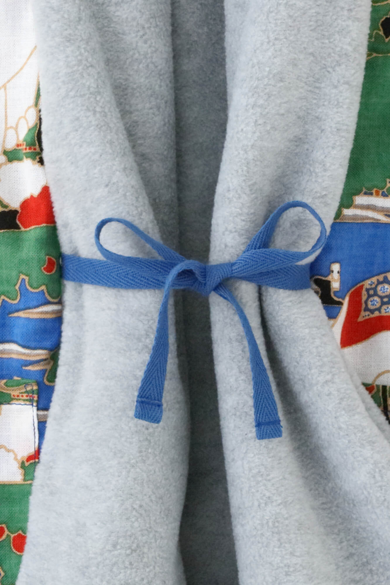 ●抓絨 梯形袖雙面短外套/黑色×怒濤