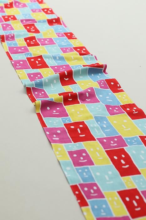 Textile sold in cuts (Isemomen Cotton Handkerchief) / Smile Faces Five-colored＜50cm＞