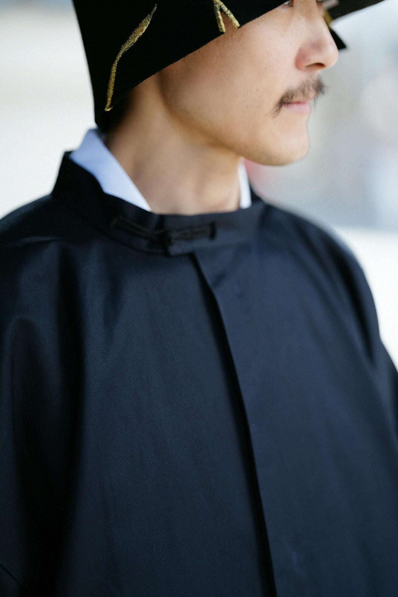 撥水織（はっすいおり） 円領外套（えんりょうがいとう）／黒紺（