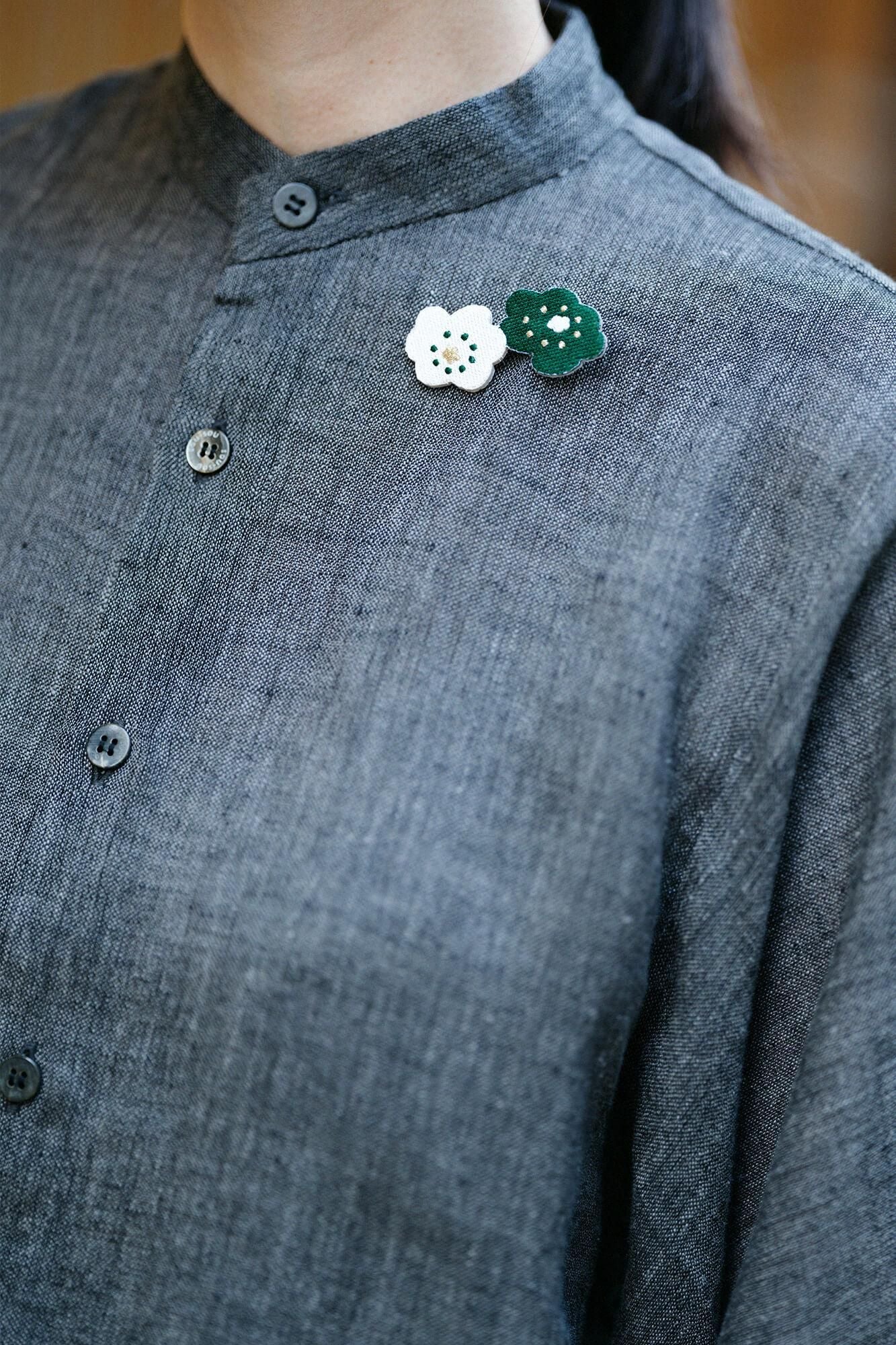 Stickereidekoration/Lächeln