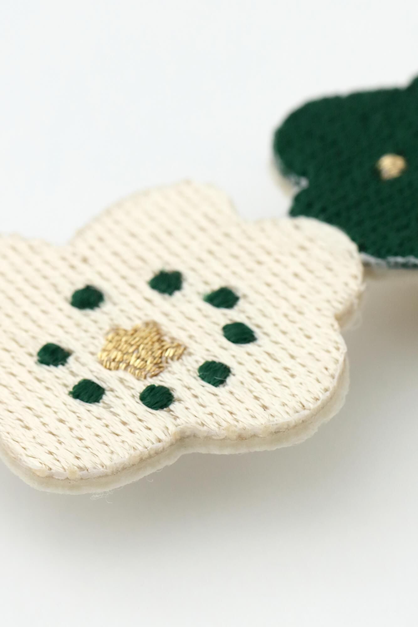 Stickereidekoration/Lächeln