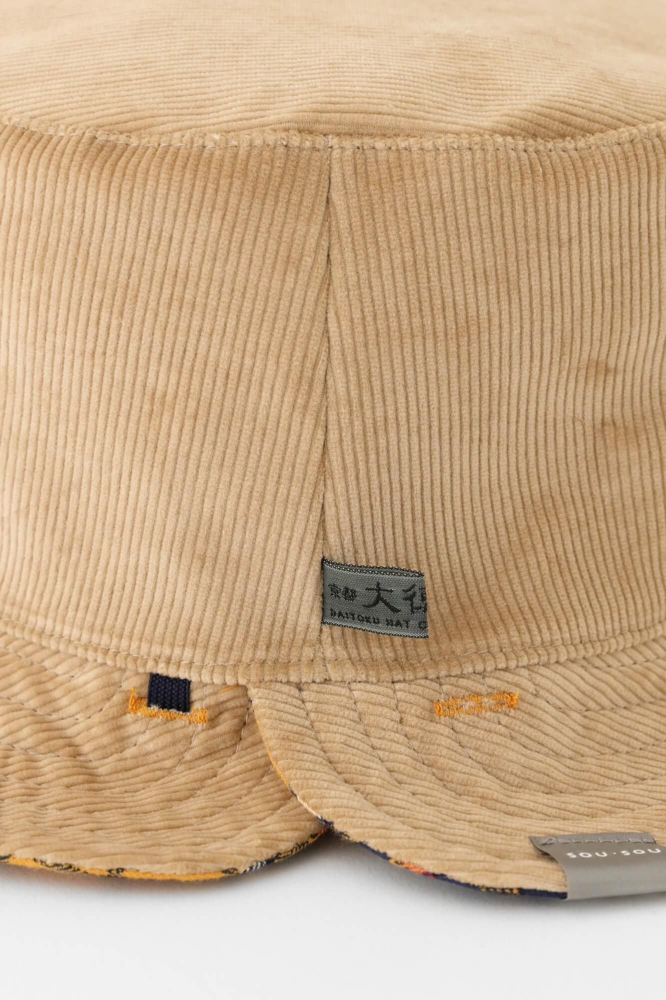 Chapeau de vélo réversible / chèque jaune x so-su-u