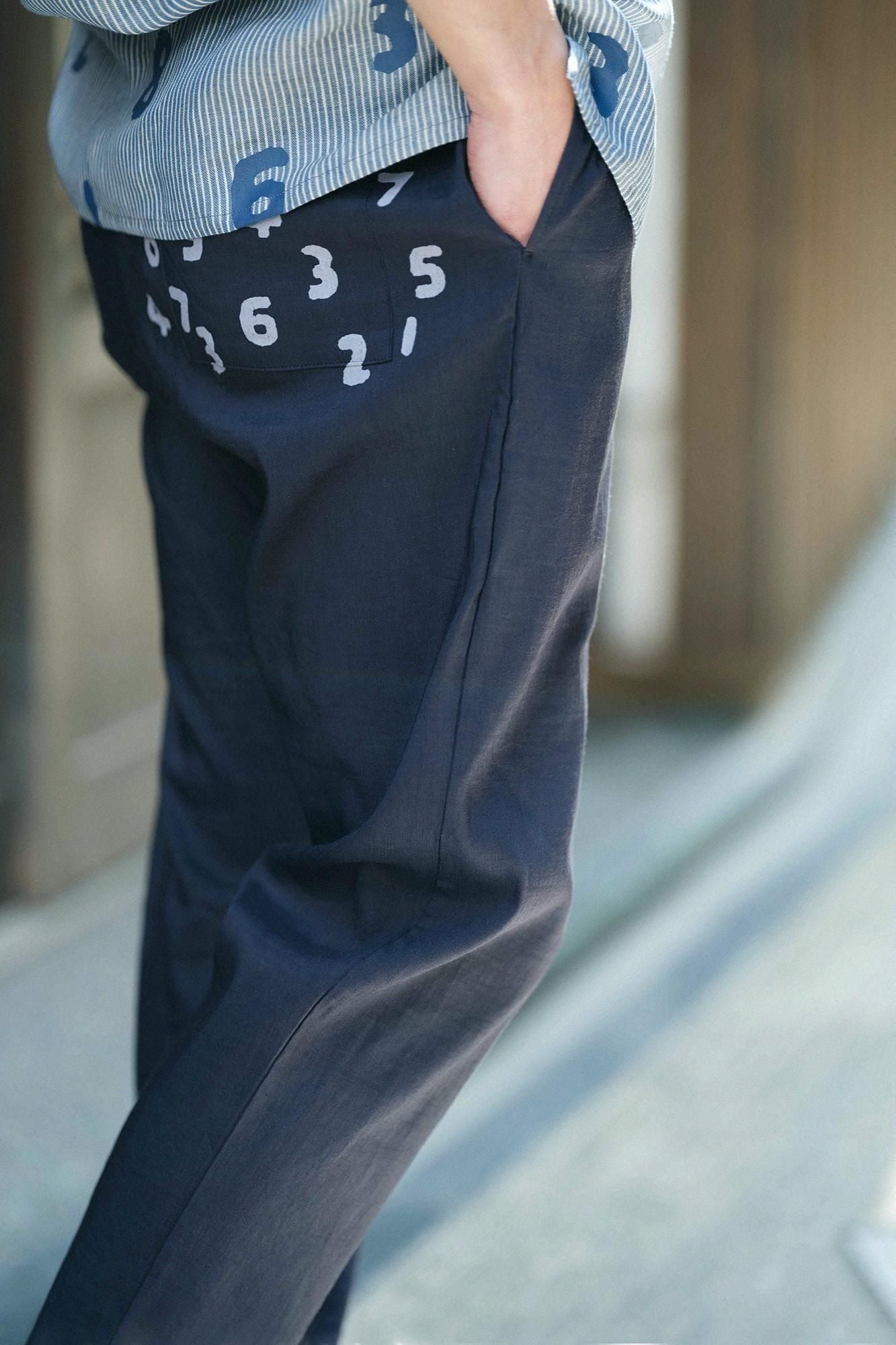 彈性亞麻人造絲 休閒窄管長褲／深藍色