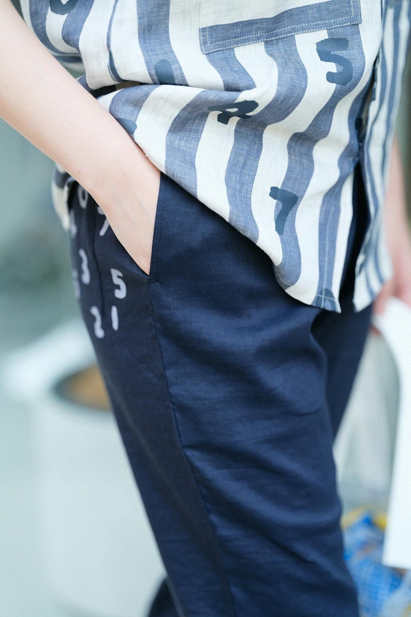 彈性亞麻人造絲 休閒窄管長褲／深藍色