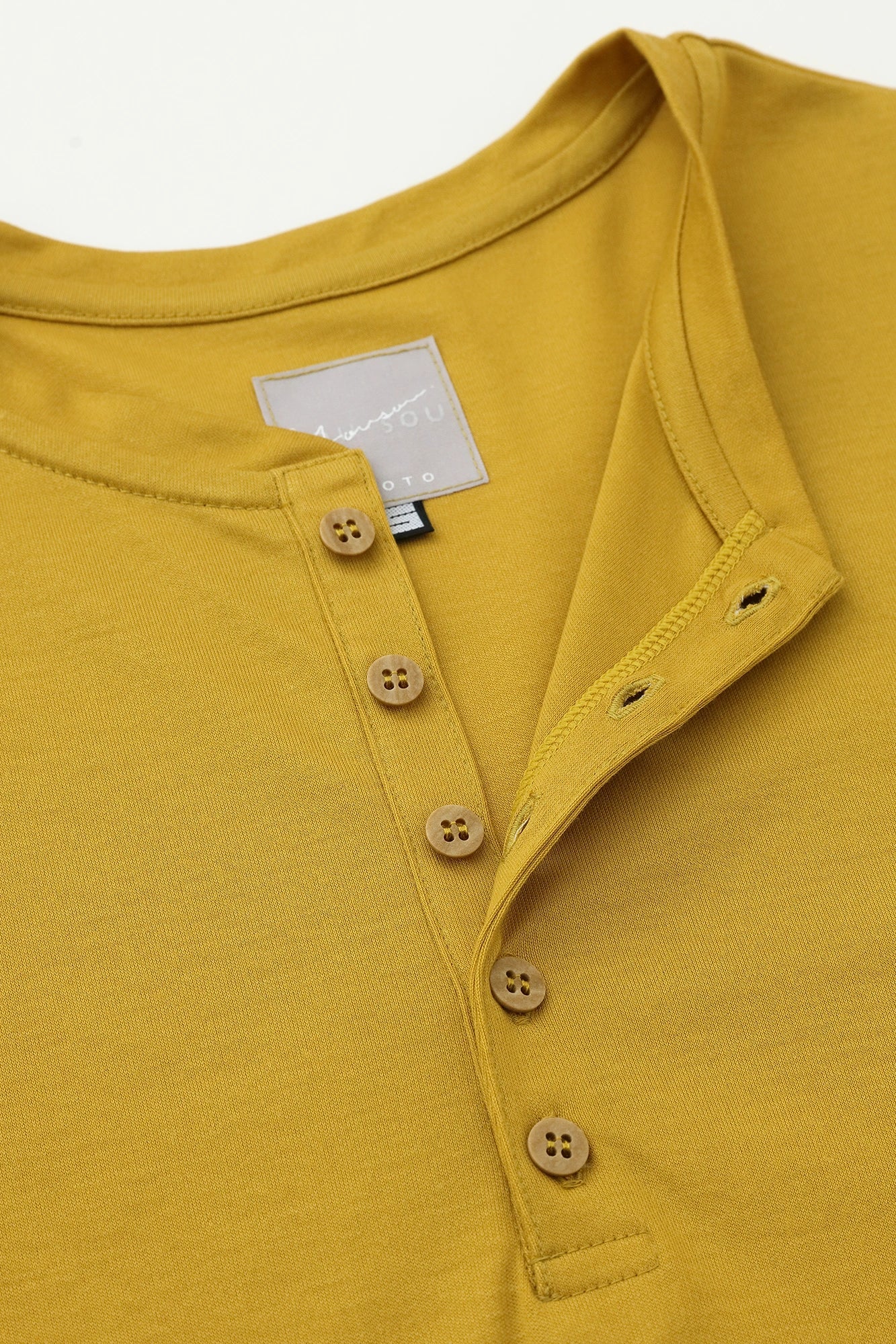 T-shirt à manches longues et col Henley lisse/jaune chromé