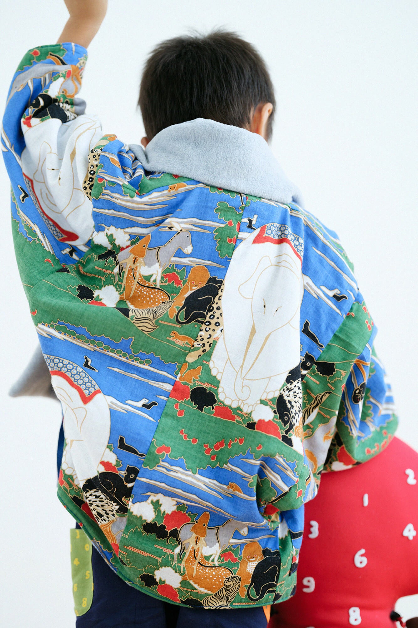 ●抓絨 梯形袖雙面短外套／黑色×怒濤