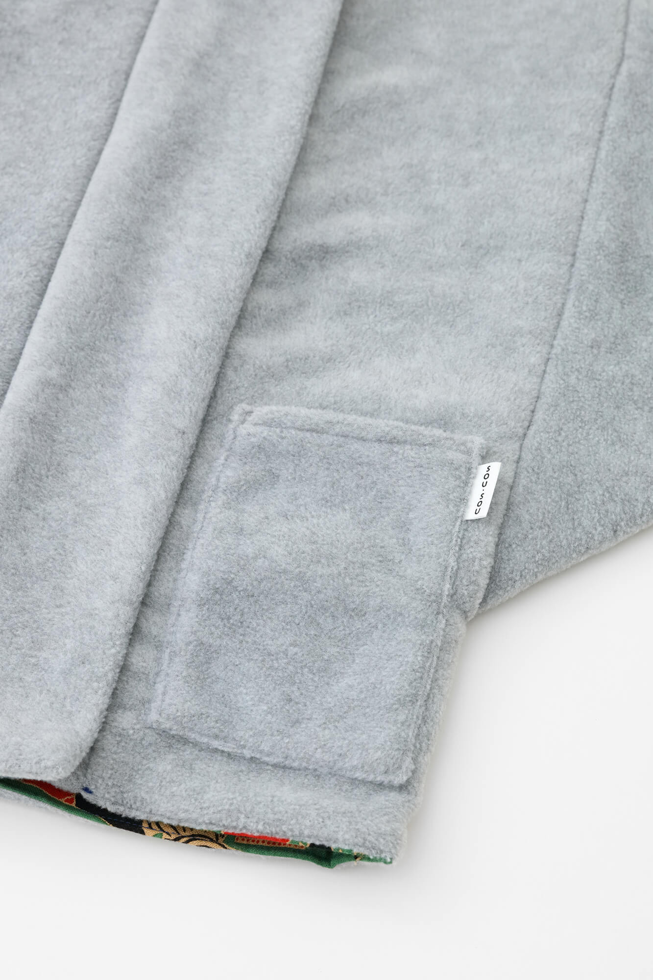 ●抓絨 梯形袖雙面短外套／黑色×怒濤