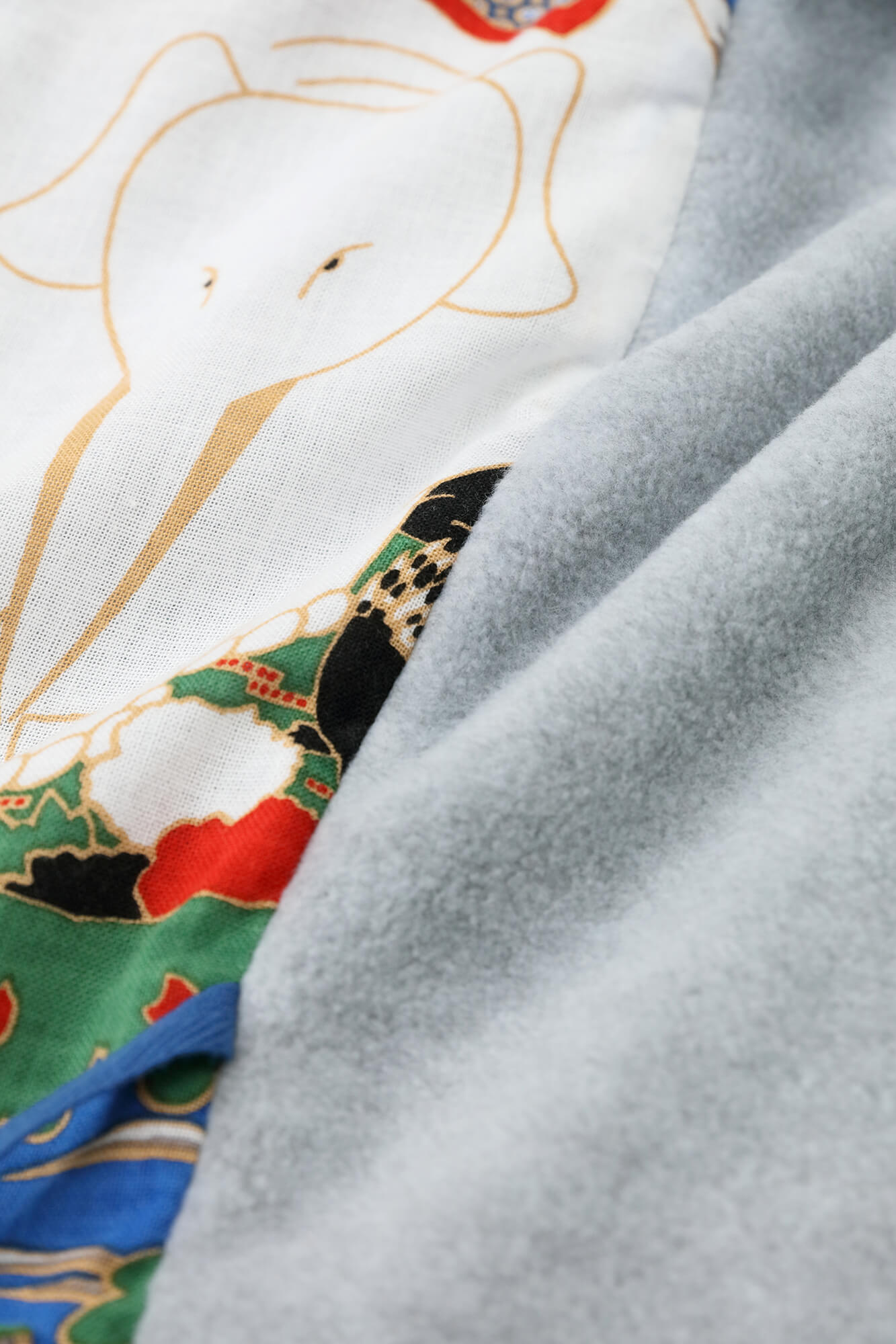 ●抓絨 梯形袖雙面短外套／黑色×怒濤